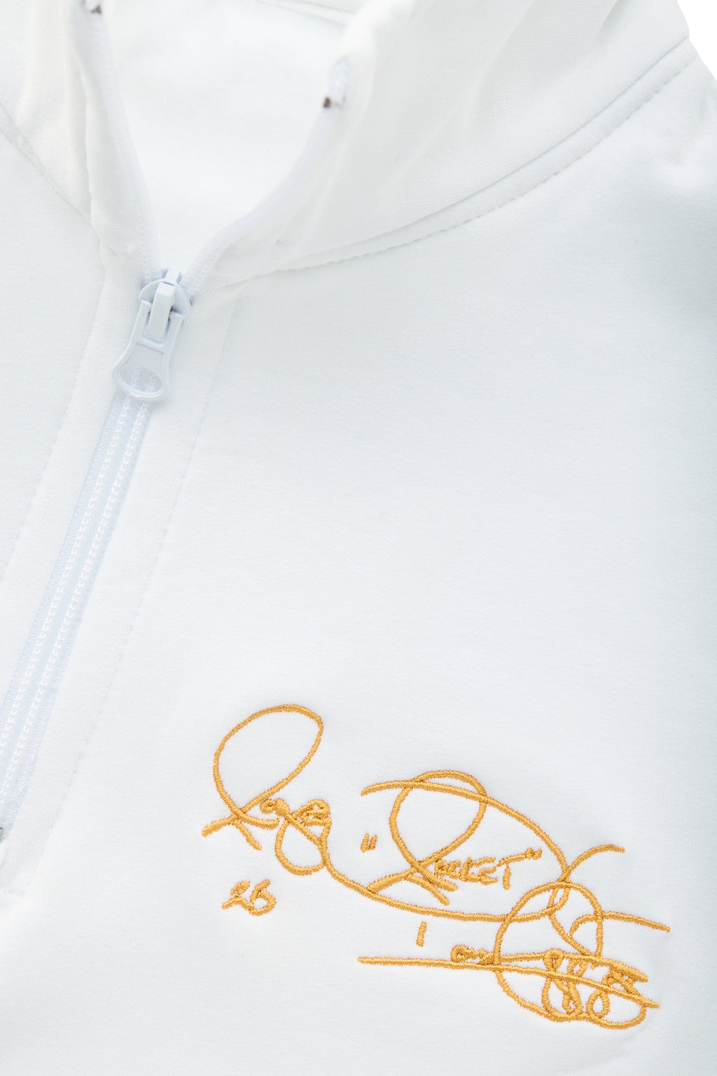 Women’s Notre Dame pullover in white with Rocket Ismail embroidered signature in gold — officially licensed Fighting Irish sweatshirt.